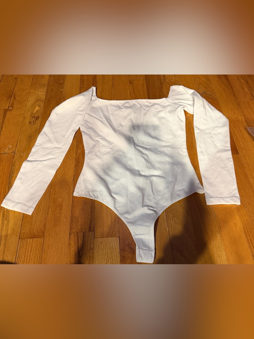 White Long-Sleeve One-Piece Bodysuit